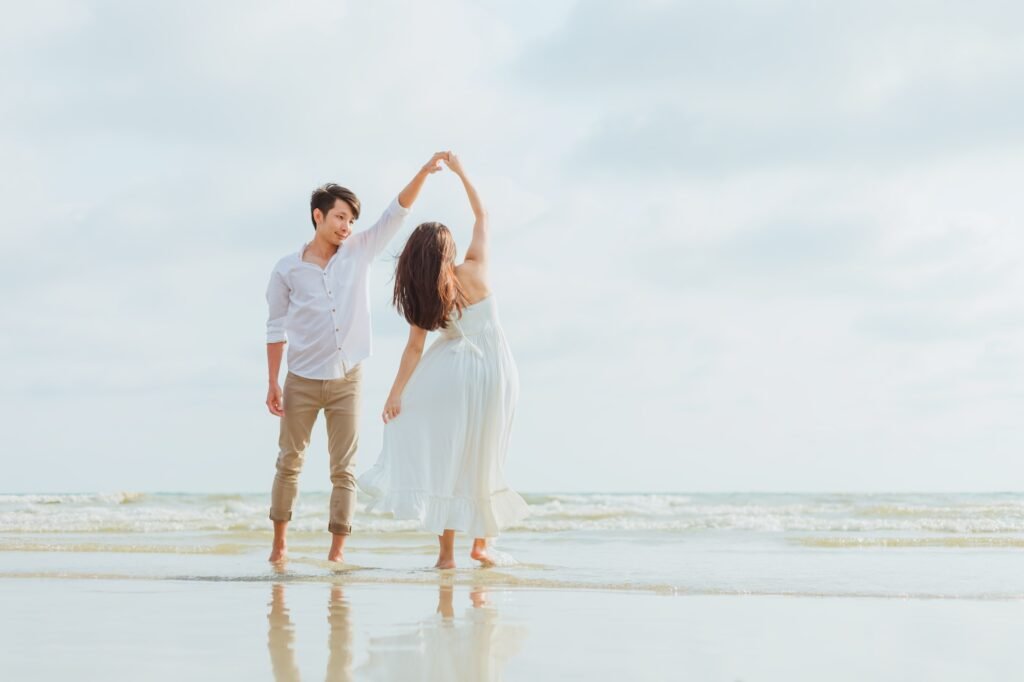 romantic time loving couple dance on the beach. Love travel concept. Honeymoon concept.